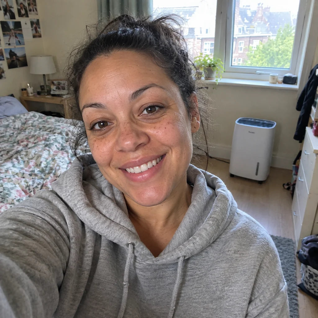 Leah in her bedroom with the Puravo Dry behind her