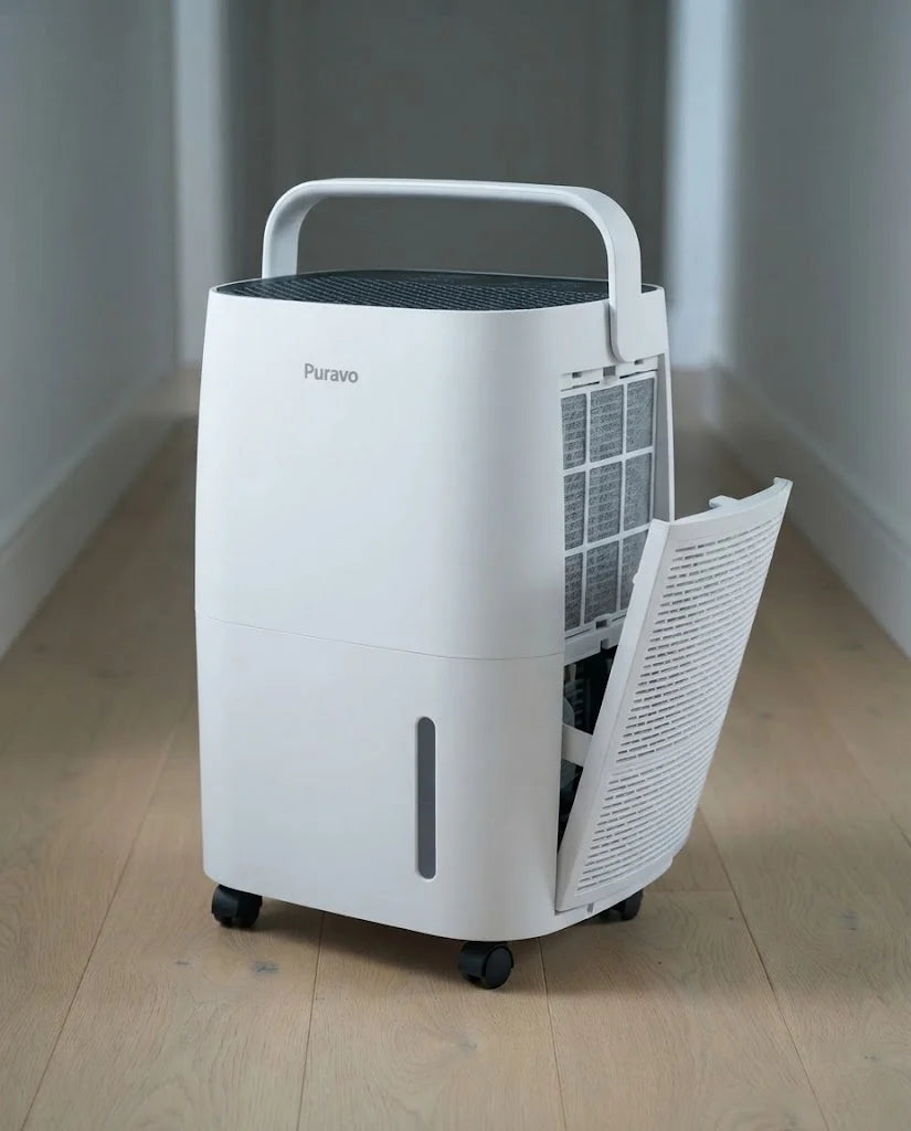 Puravo Dry with its top handle raised and the washable filter pulled out